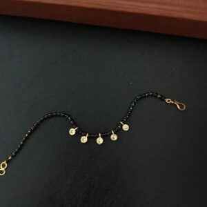 Black beaded Mangalsutra bracelet with gold-look chain and crystal charms