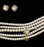 White pearl Kundan choker necklace set with green bead pendant and matching earrings